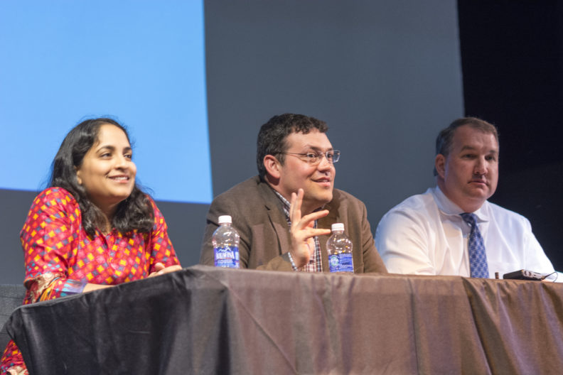College of Medicine Clinical Assistant Professors Radha Nandagopal, Chris Davis and Henry Mroch preside over a panel discussion about careers in medicine at Spokane's West Valley High School on April 25, 2016.